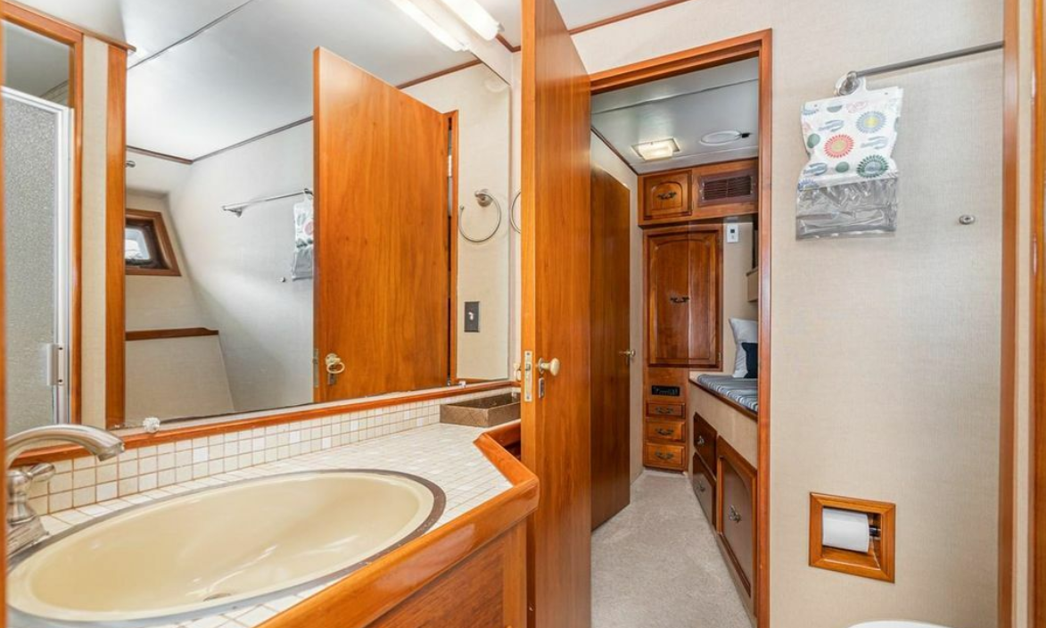 Private guest head with sink and shower aboard M/Y Oceana